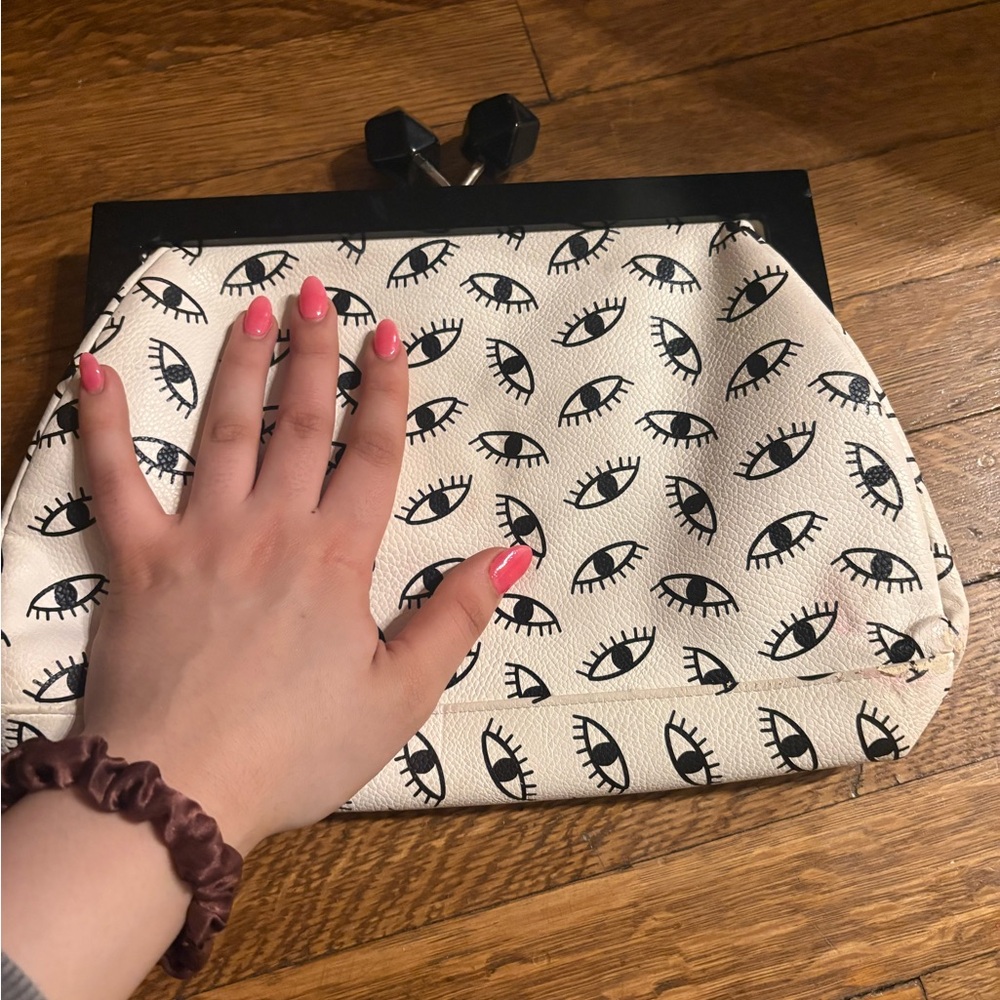 White and Black Eye Pattern Clutch